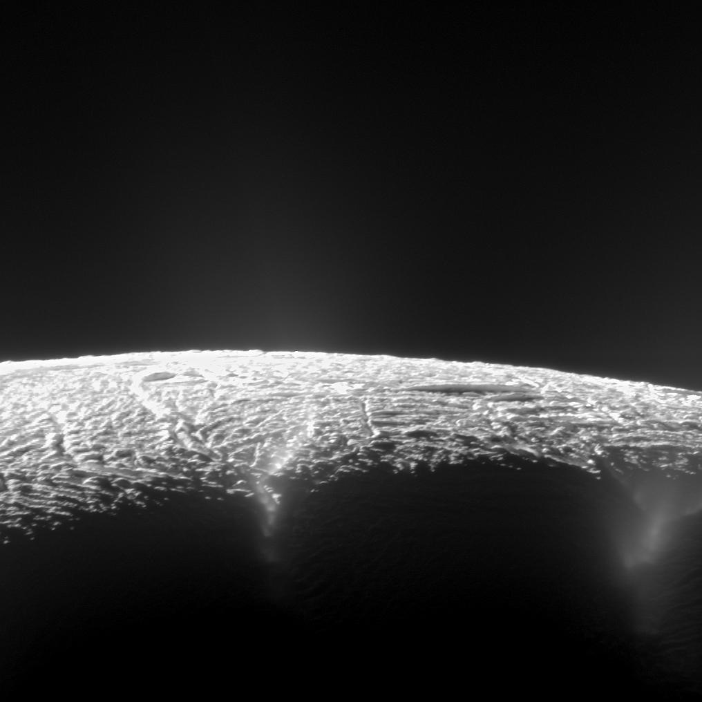 This dramatic view looks across the region of Enceladus' geyser basin and down on the ends of the Baghdad and Damascus fractures that face Saturn.
