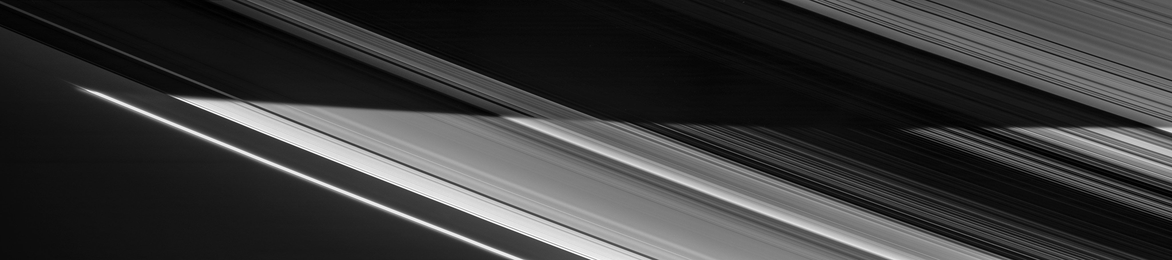 A four-image mosaic of Saturn's rings