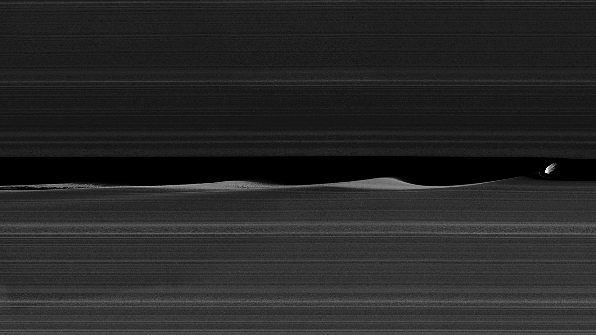 Daphnis, one of Saturn's ring-embedded moons