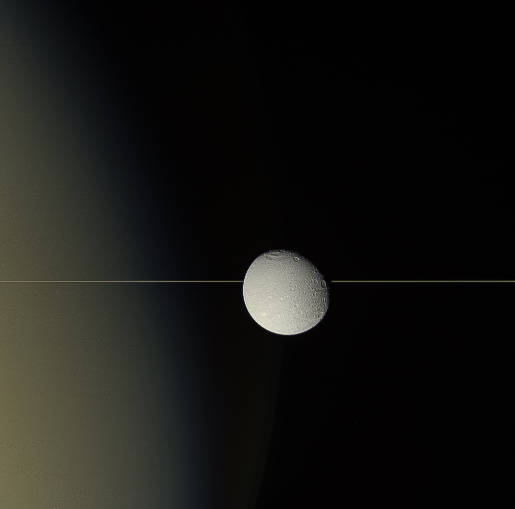 Dione and Saturn's rings seen edge on