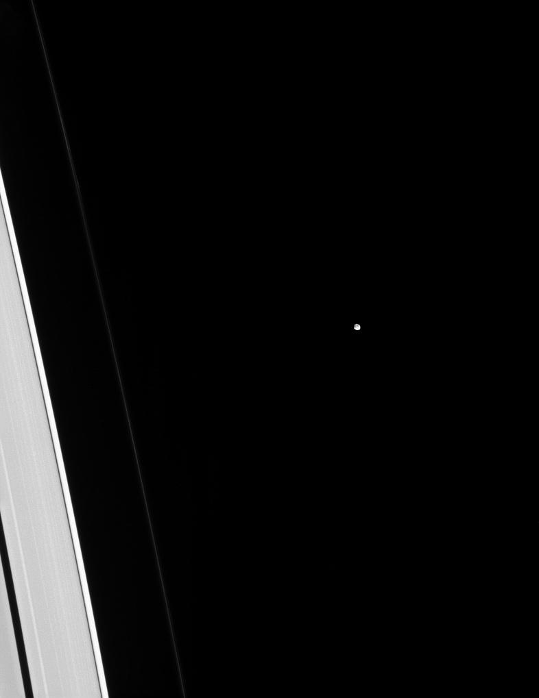 Tiny Epimetheus is dwarfed by adjacent slivers of the A and F rings