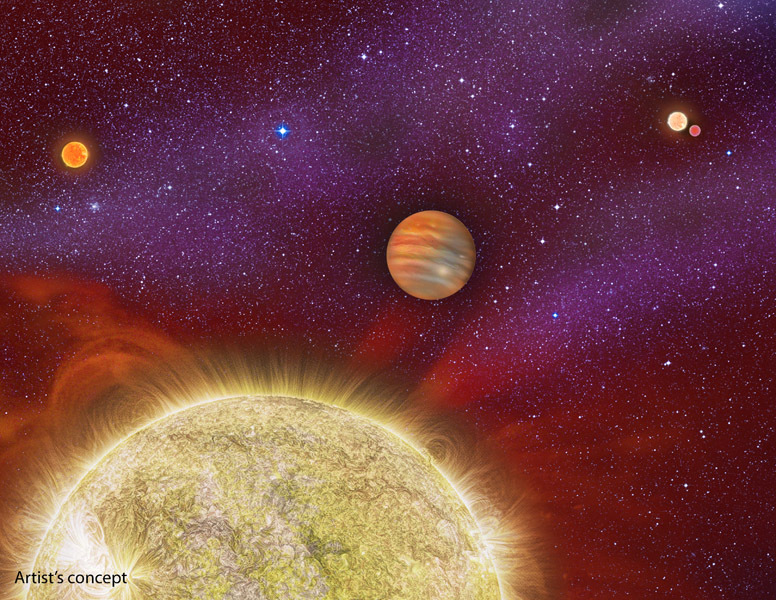 This artist's conception shows the 30 Ari system, which includes four stars and a planet. The planet, a gas giant, orbits its primary star (yellow) in about a year's time. Image copyright: Karen Teramura, UH IfA