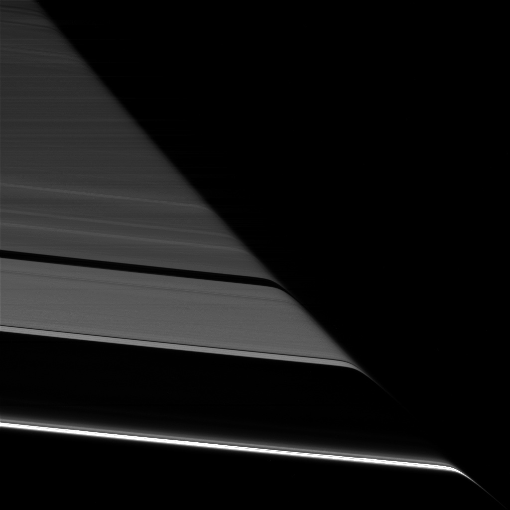 Black and white image of Saturn and its rings.
