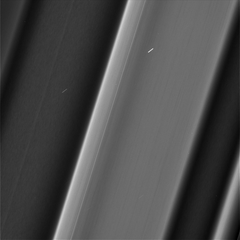 Black and white images show variations in the texture of Saturn's C ring.