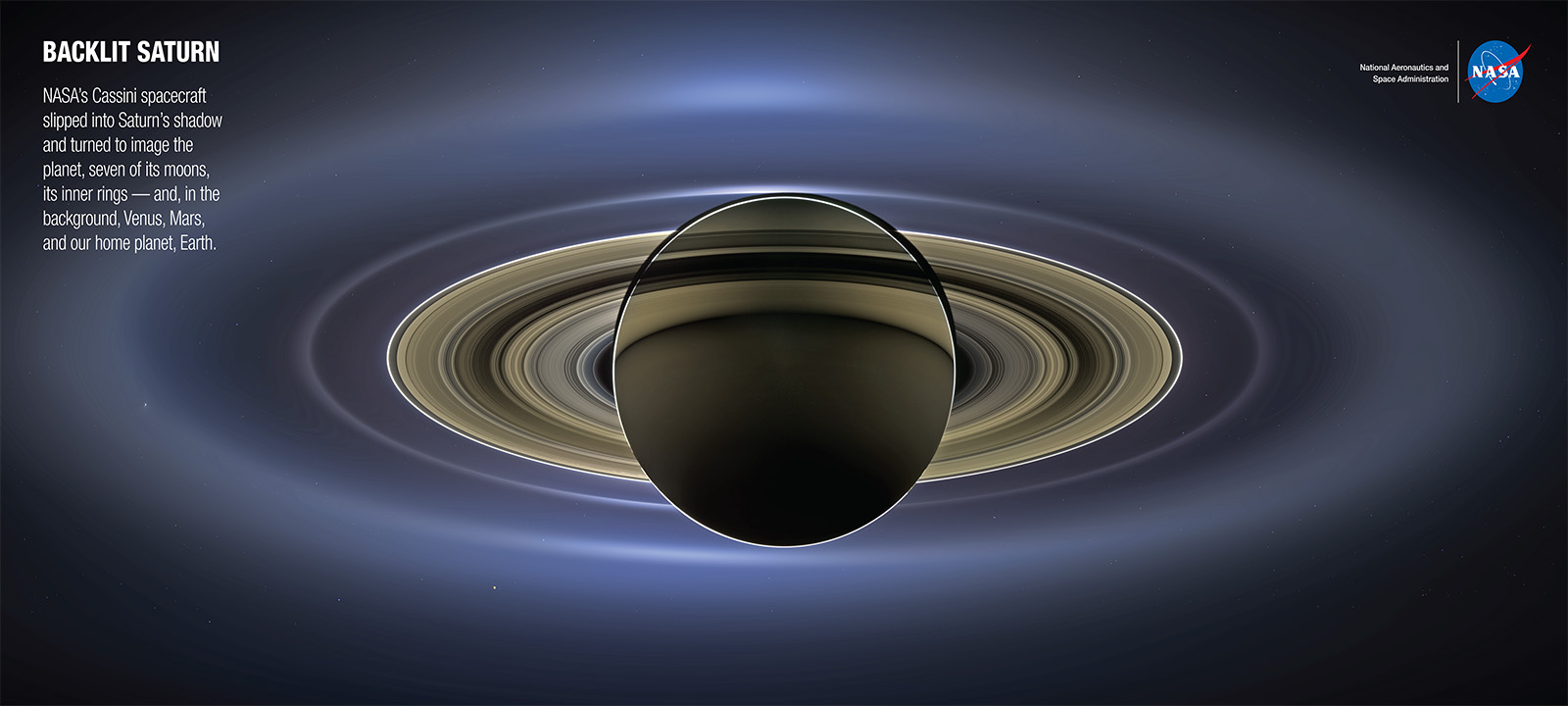 Poster-sized image of Saturn illuminated by the sun from behind.