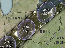 A portion of the path of the total solar eclipse, zoomed in on Indiana and Ohio. A dark gray line goes through the states, with circles labeled 3:10 EDT and 3:15 EDT.