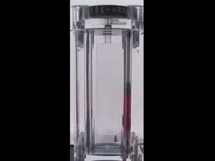 A video shows a vial of pink liquid rising to the top.