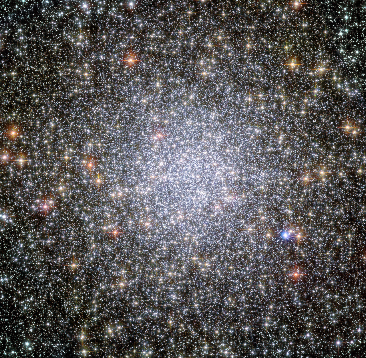 Globular star clusters like this one, 47 Tucanae, might be excellent places to search for interstellar civilizations. Their crowded nature means intelligent life at our stage of technological advancement could send probes to the nearest stars. Image credit: NASA/ESA/Hubble Heritage