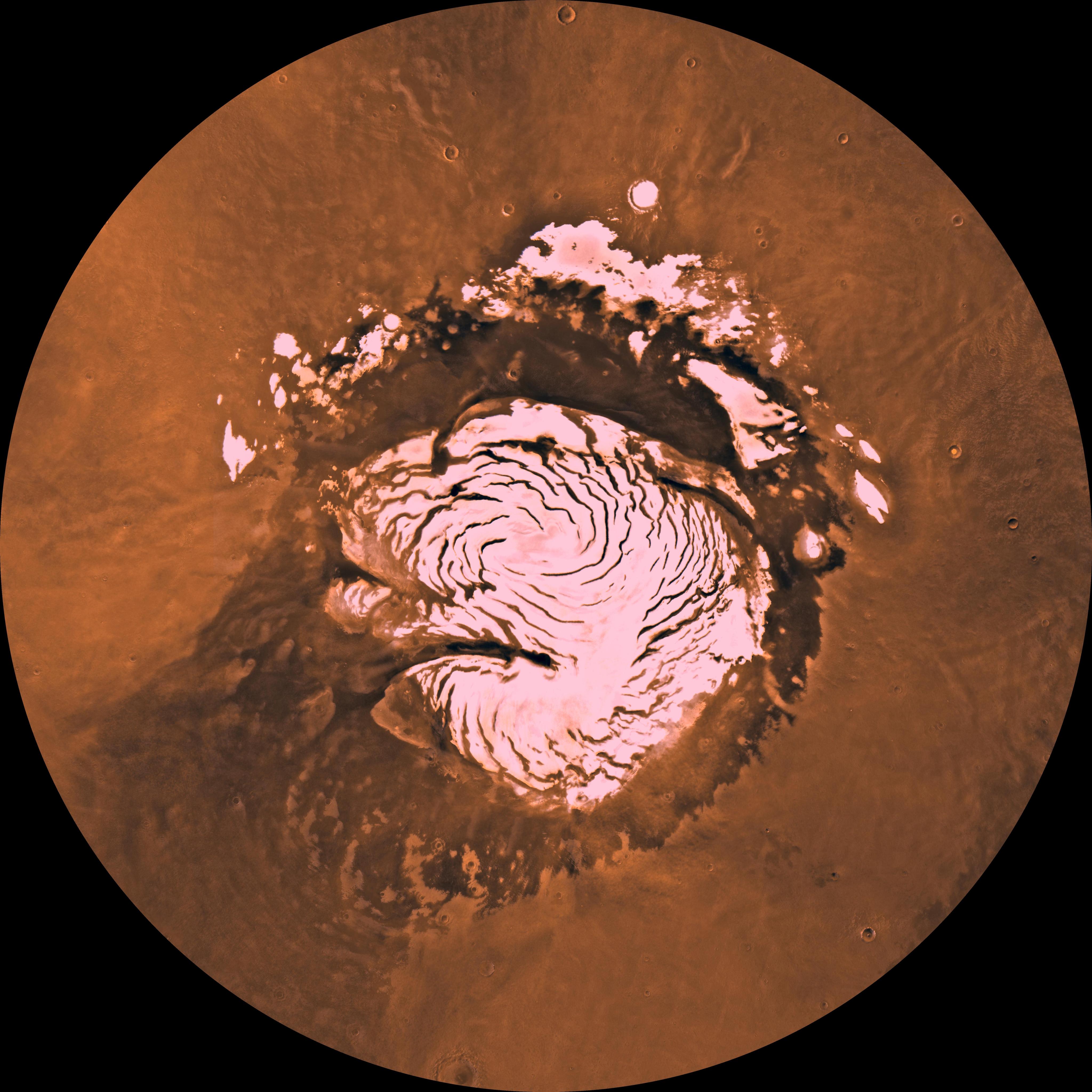 A swirling icecap stands out from the reddish Martian surface in this mosaic of images taken from orbit.