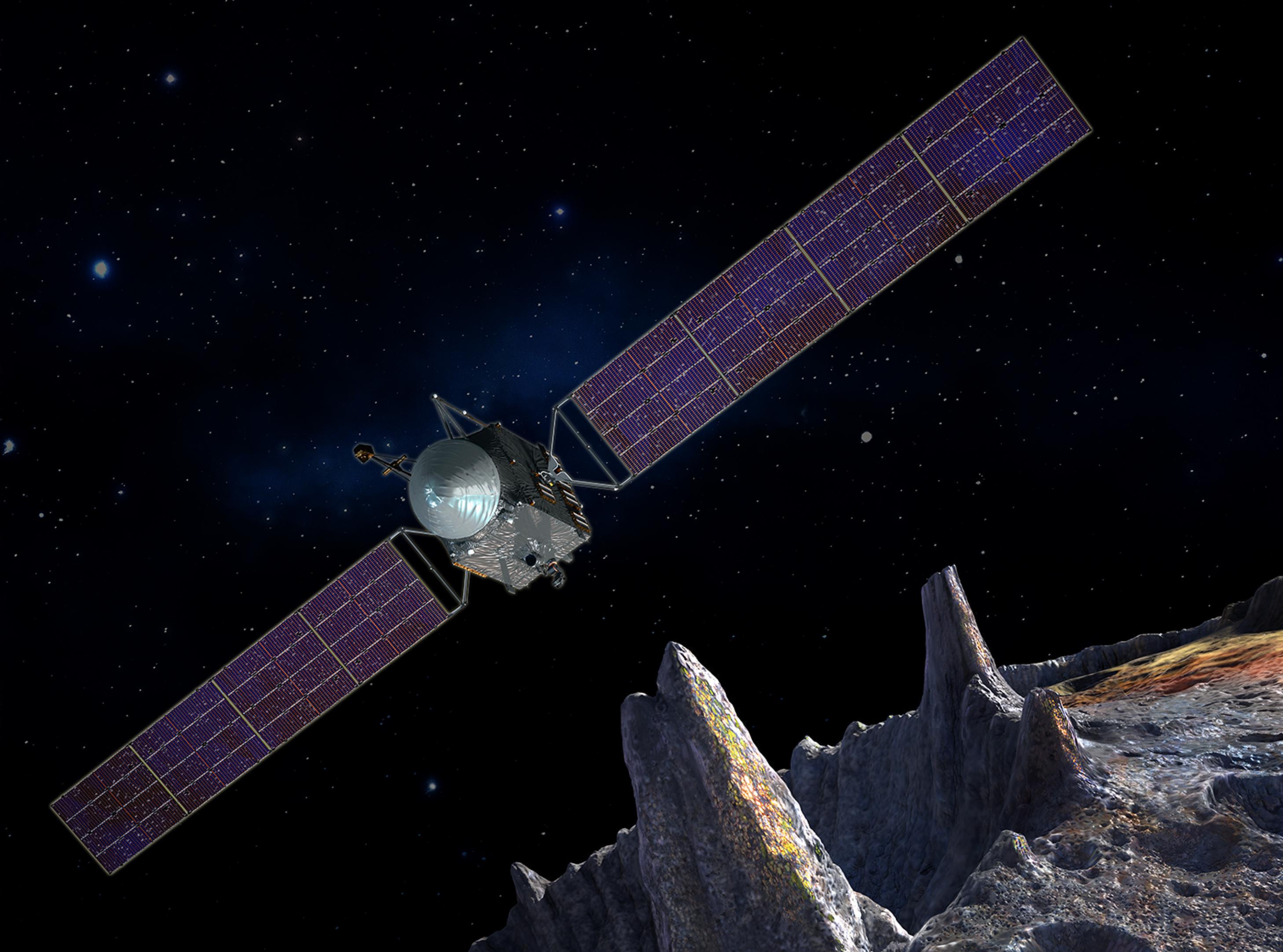 An illustration of the Psyche spacecraft with its solar panels extended flying over asteroid Psyche.