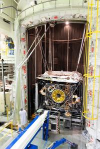 The Psyche spacecraft is moved into a vacuum chamber.