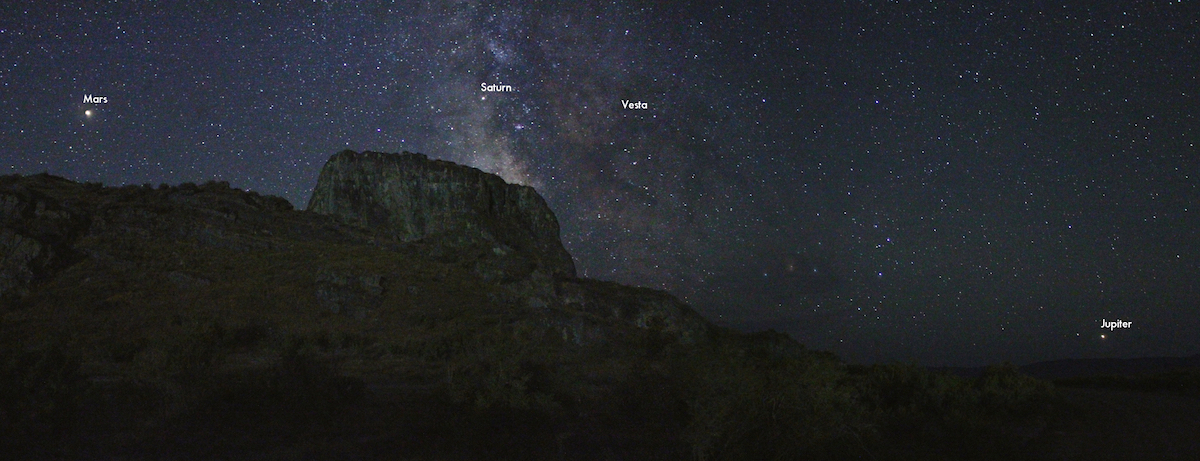 planets along the horizon in photo of night sky
