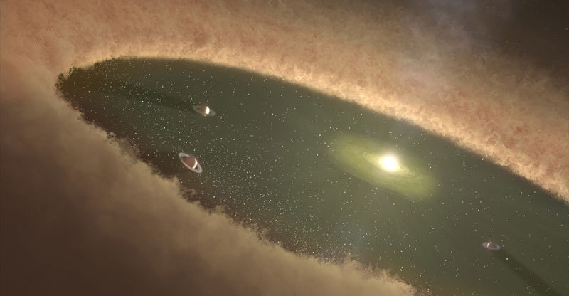 This artist's concept depicts giant planets circling between belts of dust. Scientists think the star system HD 95086 may have a planetary architecture similar to this. While the star system's two dust belts are known, along with one massive planet, more giant planets may lurk unseen. Image credit: NASA/JPL-Caltech