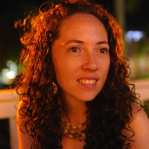 Portrait photo of a woman with long curly hair