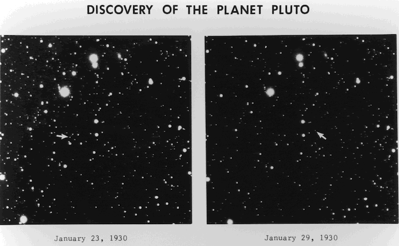 Two star-dotted images of space sit side-by-side, one labeled “January 23, 1930” and the second “January 29, 1930.”. A small white arrow is visible in each image, in a different place, pointing out a small light spot - Pluto - that has moved from one image to other.