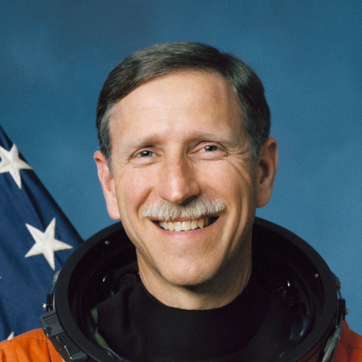 Cropped version of the official astronaut portrait of Richard Covey.