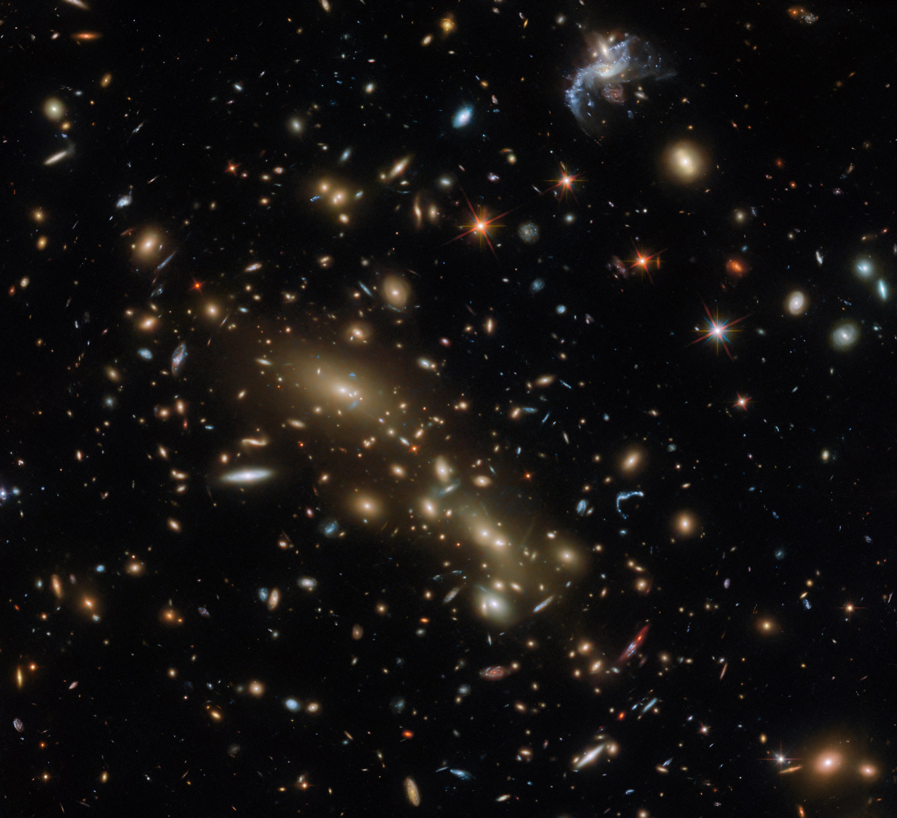 Hubble Views a Double Cluster of Glowing Galaxies - NASA Science