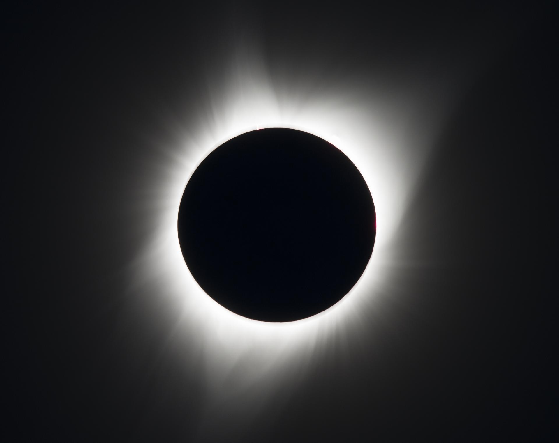 A total solar eclipse is seen on Monday, August 21, 2017 above Madras, Oregon. A total solar eclipse swept across a narrow portion of the contiguous United States from Lincoln Beach, Oregon to Charleston, South Carolina. A partial solar eclipse was visible across the entire North American continent along with parts of South America, Africa, and Europe. Photo Credit: (NASA/Aubrey Gemignani)