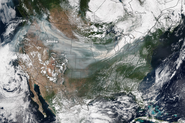 A smoke plume spans the United States. NASA Earth Observatory image by Jesse Allen, using VIIRS data from the Suomi National Polar-orbiting Partnership.