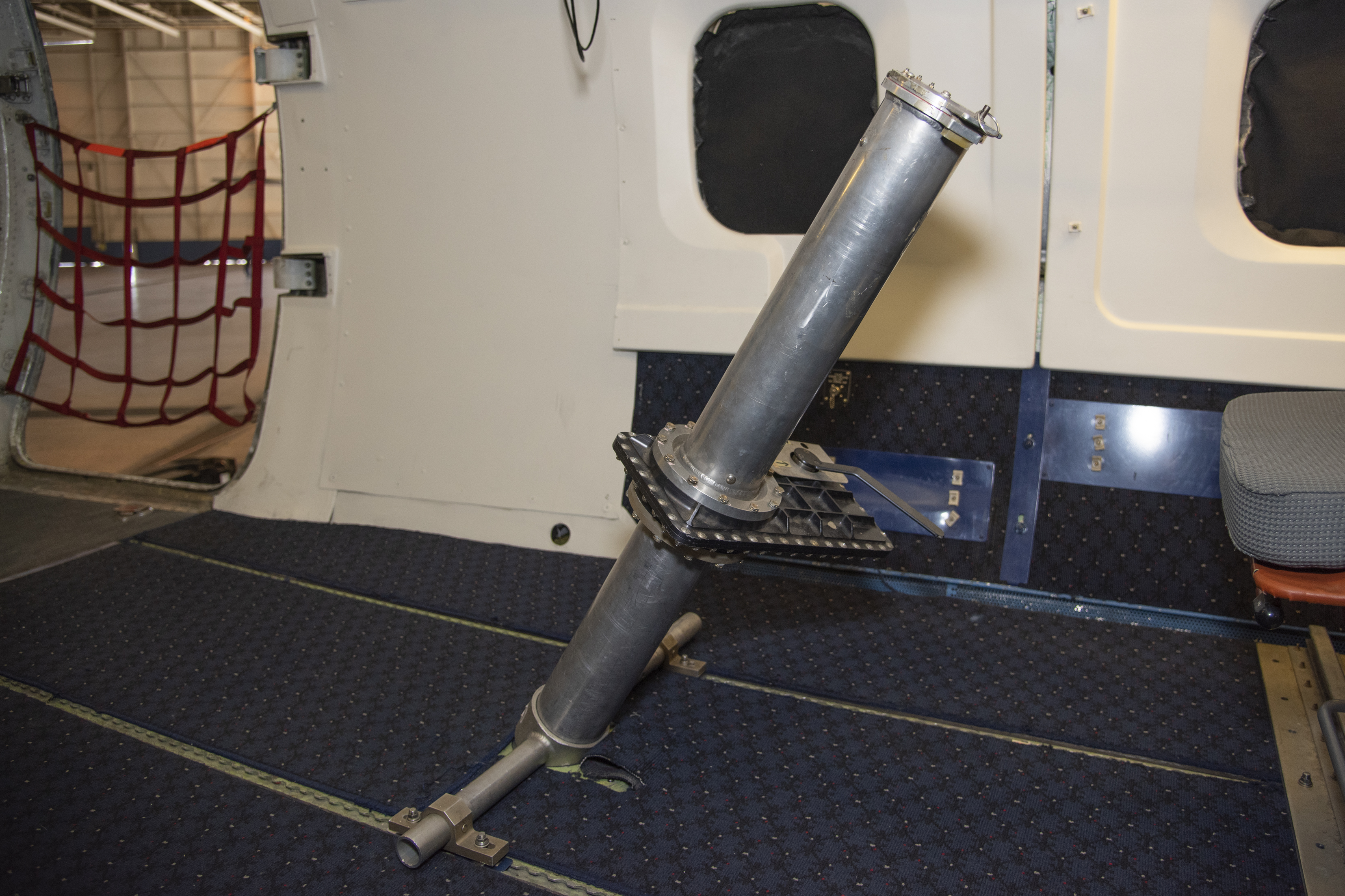 A dropsonde, which will to collect wind and water vapor data