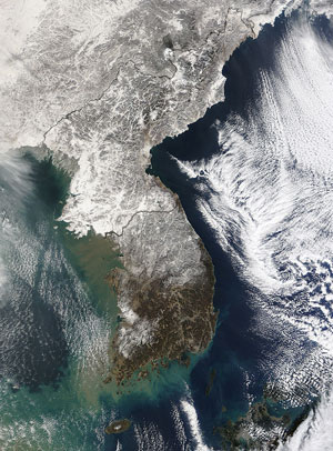 Korean Peninsula: On the other side of the world, Arctic weather was also brought to bear on the Korean Peninsula. This image was taken on Jan. 3, 2010. Scientists say this year's severe winter weather is still to be expected from time to time, even as increased concentrations of man-made greenhouse gases create a long-term warming trend for the planet. Image courtesy of NASA, MODIS Rapid Response