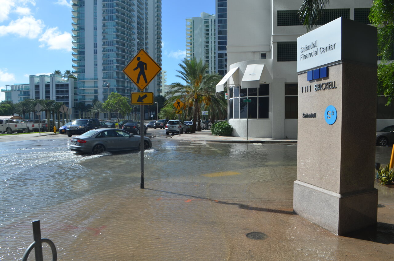 Sunny day high tide nuisance flooding in downtown Miami, Florida in October 2016.