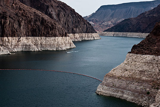 Depleted surface water in the Colorado River Basin has left this visible "bathtub ring" of mineral deposits on Lake Mead. But underground water loss is invisible. Credit: U.S. Bureau of Reclamation.