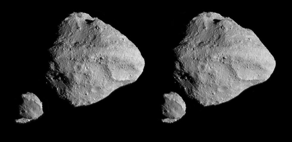 Two images of two gray colored asteroids. One of the space rocks is much larger.