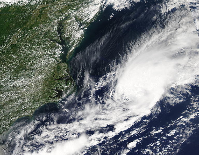 NASA’s Aqua satellite acquired this image of a storm off the coast of North Carolina as it strengthened into Tropical Storm Bill on June 14, 2021.