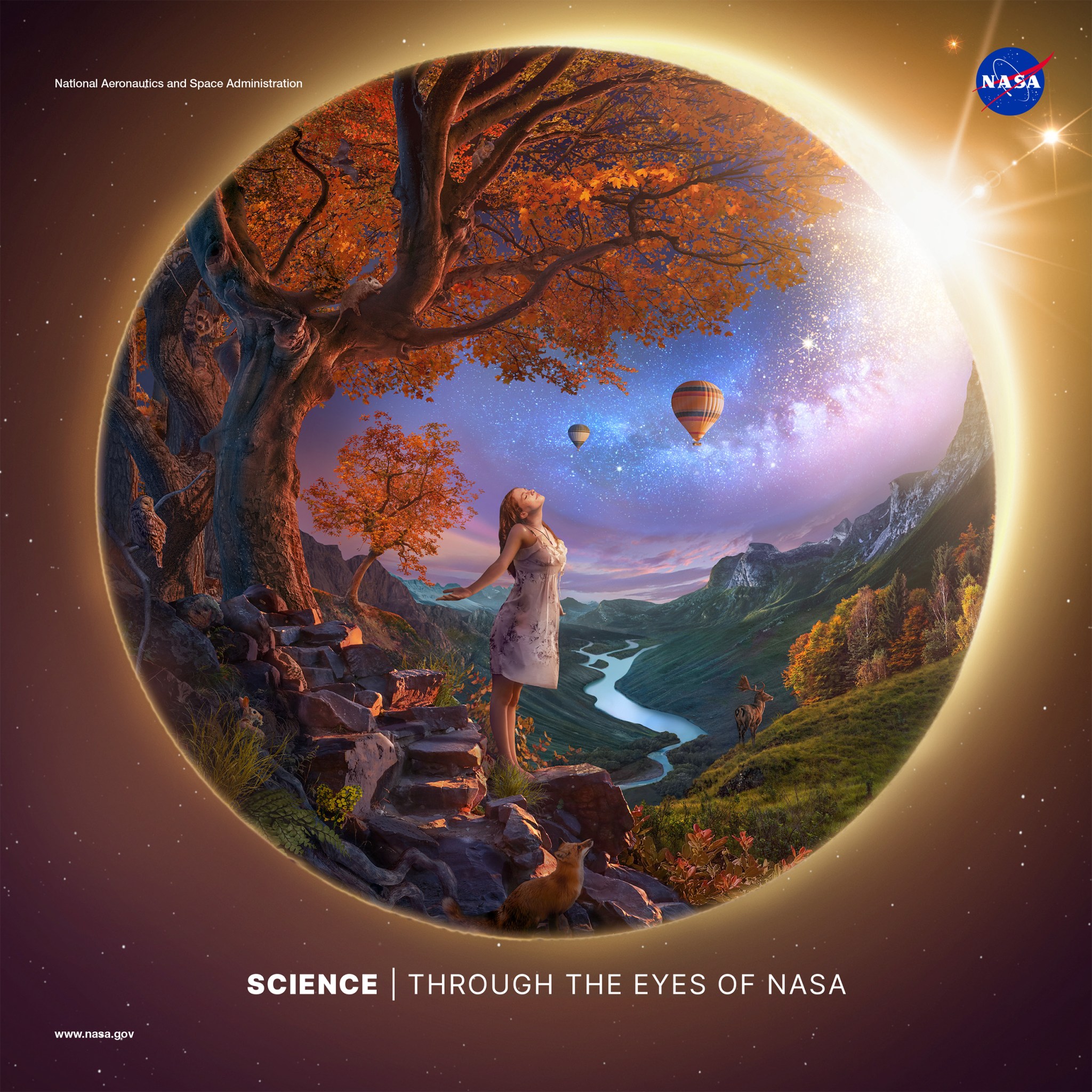 An artist’s concept of a landscape framed inside a sphere, which doubles as an eclipse. The concept is composed of dusky purples, oranges, golds, and greens. In the left foreground, a young woman wearing a white dress basks in the rays of a solar eclipse. She stands under a bright orange fall tree rooted to the side of a rocky mountain trail. The scene overlooks a valley with a river running through the middle towards distant hazy blue mountains. Nocturnal animals – including a fox, owl, possum, and bat – emerge to investigate the sudden onset of night. A deer stands on a grassy knoll at right in front of a line of fall colored trees. The Milky Way trails across the sky, leading up from the young woman to the eclipse and glittering stars at top right. Two hot air balloons float in the distance. This concept was created in celebration of the Heliophysics Big Year, which is bookended by the Annular Eclipse in October of 2023 and the Total Solar Eclipse in April of 2024. It also serves as the cover of the 2024 NASA Science Planning Guide.