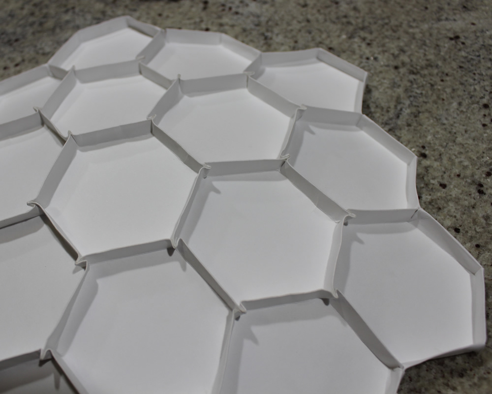 Example of a back view of the Webb Mirror Origami showing many of the hexagon shaped segments interlocked.
