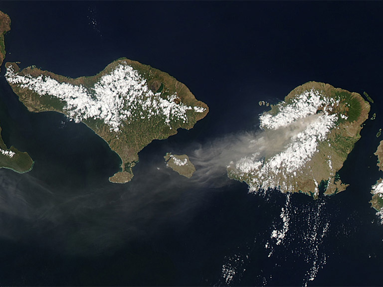 A satellite photo of an erupting volcano.