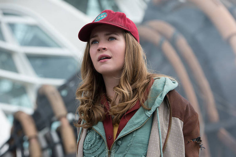 Main character Casey Newton marvels at the wonders of Tomorrowland as portrayed in the film. Credit: Disney. View larger image.