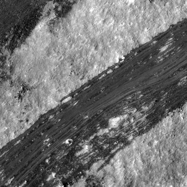 Dark material on the wall of a Copernican crater