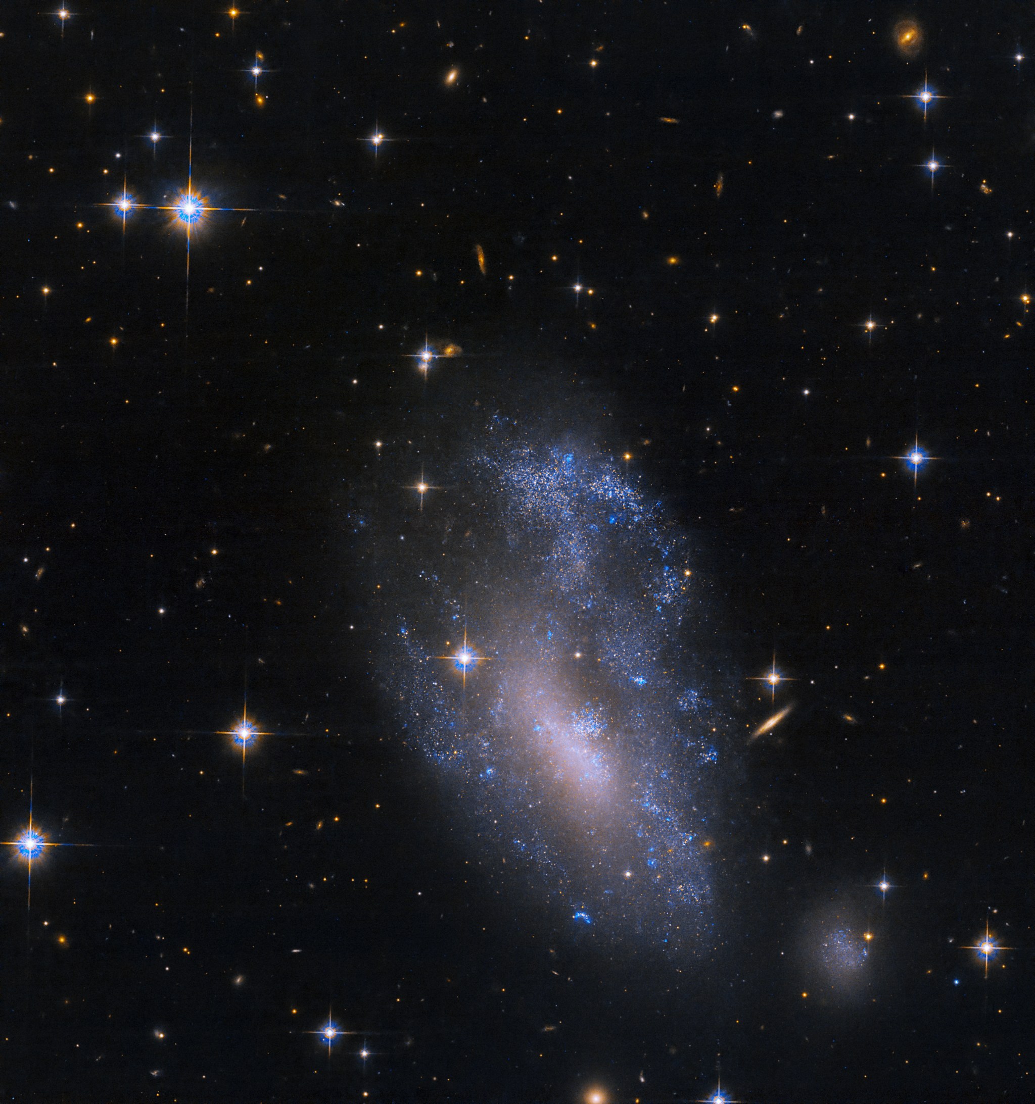 Hubble Captures a Suspected Galaxy Encounter - NASA Science