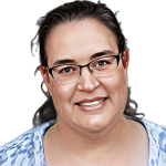 Photoshop-generated illustration of dark-haired woman, hair pulled back, with glasses and blue patterned blouse