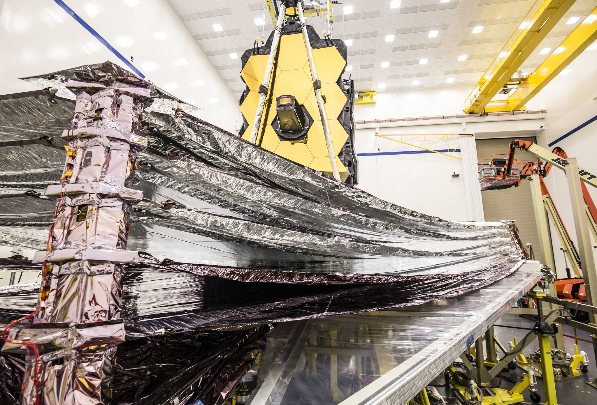 This image is from October 2019 when technicians successfully performed a critical test on Webb's 5-layer sunshield by fully deploying each of its uniquely sized layers to the same position that they will have while orbiting the Sun a million miles away from Earth.