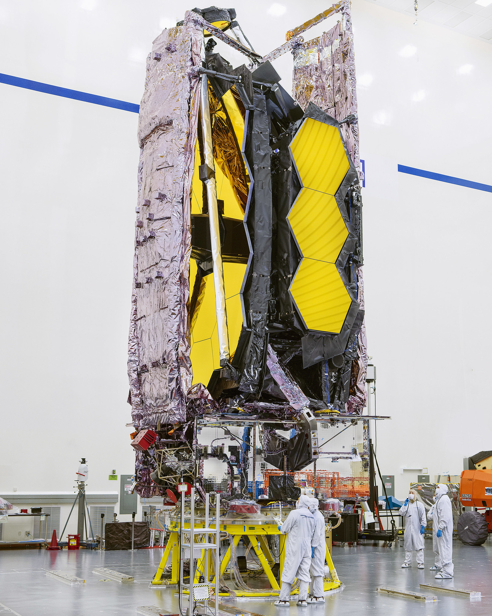 This archival image is from May 2021 when Webb was at the Northrop Grumman facility. During this approximate time period (late spring to early summer), the telescope was having its sunshield packed up and prepped for launch, and the final test fold of the mirror wings was also taking place.