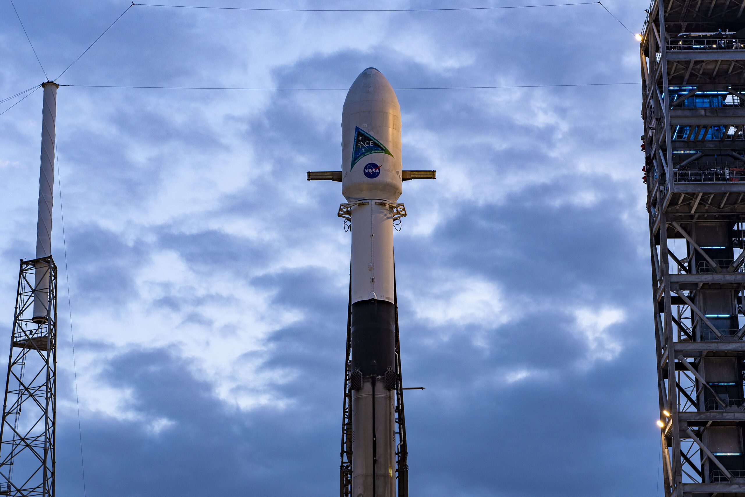 PACE spacecraft atop SpaceX Falcon 9 rocket.