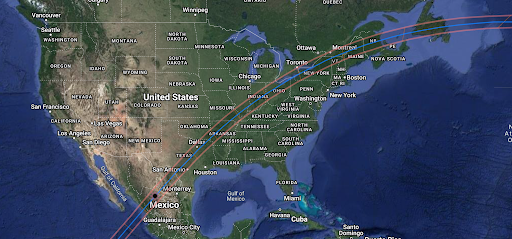 A band of shade, outlined in red with a central blue line, crosses a true color image of the United States and the northern parts of Mexico and southern parts of Canada. This band indicates all the places from which the total solar eclipse will be visible on April 8, 2024. The band is approximately 125 miles wide. It comes ashore at the southerly end of the Gulf of California and crosses in an arcing diagonal across the United States from San Antonio, Texas, across parts of Oklahoma, Arkansas, Missouri, Illinois, Kentucky, Indiana, Ohio, Pennsylvania, New York, Vermont, New Hampshire, and Maine and then into New Brunswick, Canada. It crosses the Gulf of St Lawrence, then across central Newfoundland before moving out over the North Atlantic Ocean.