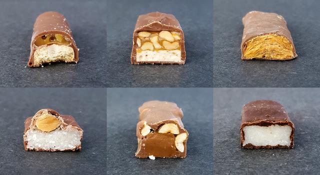 Six chocolate candy bars cut into a cross-section to resemble rock formations
