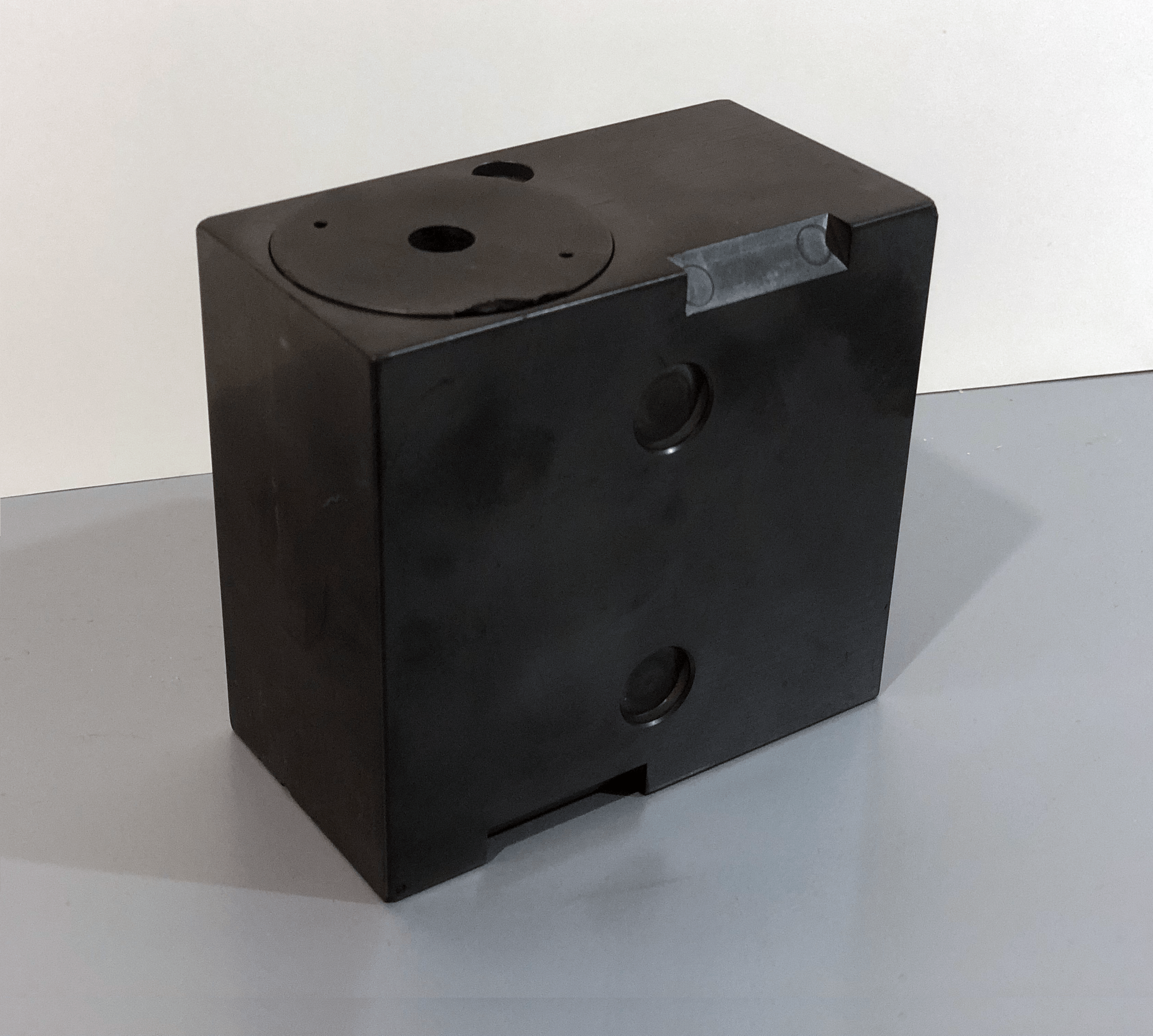 A small, square black box.