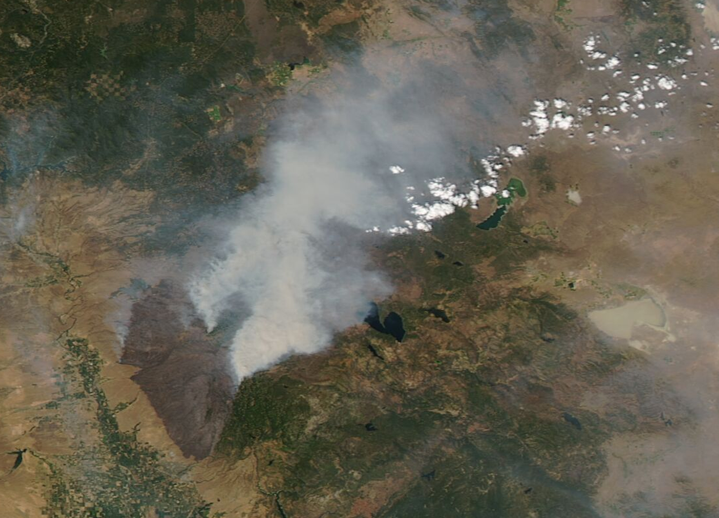 An image from space of the Park fire with smoke as seen from orbit.