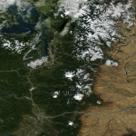 An image from orbit showing new snow in the Pacific Northwest area of the USA.