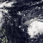 An image of four tropical storms in the western pacific ocean as seen from orbit.