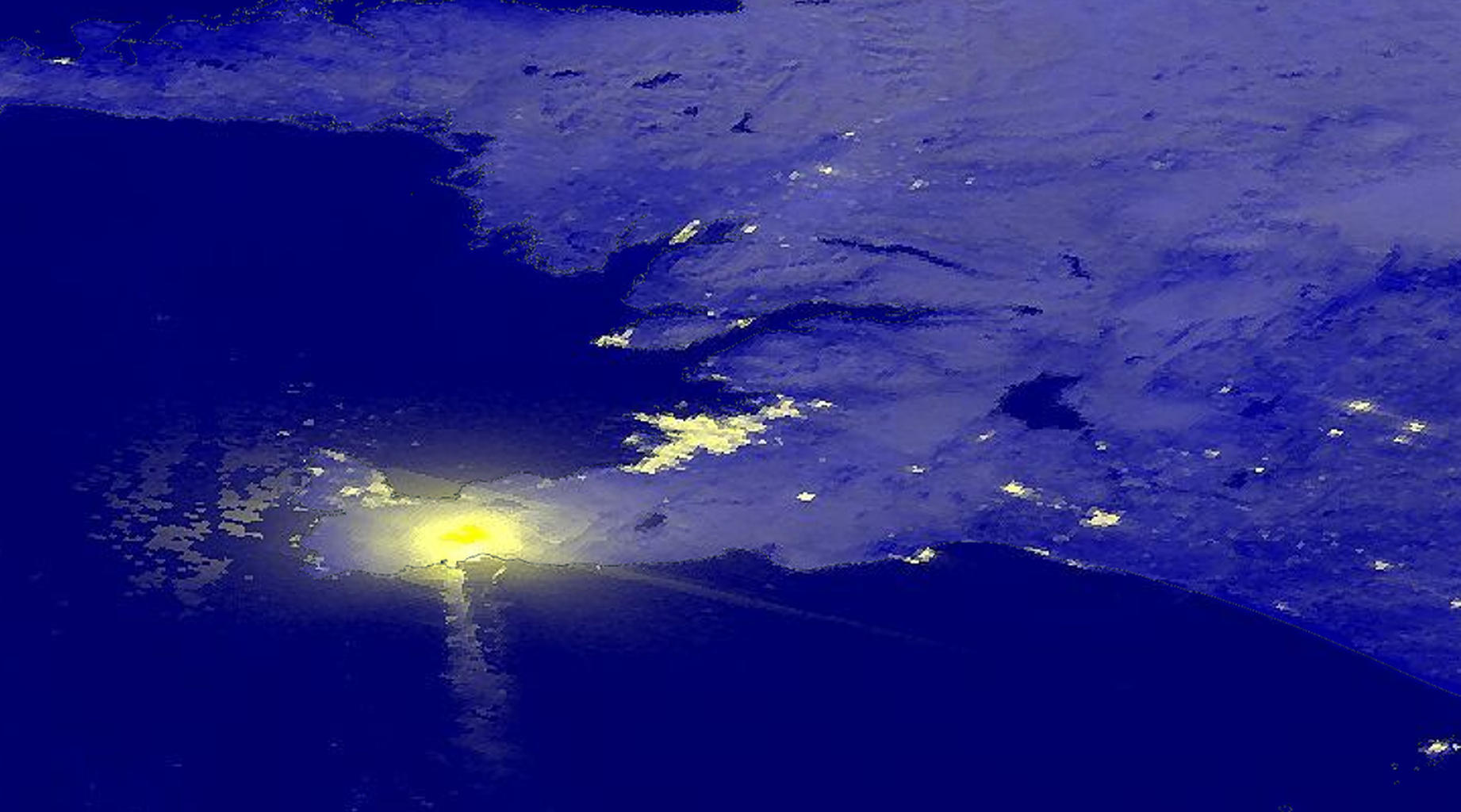 A view from orbit of a volcano glowing at night on November 21st, 2024.