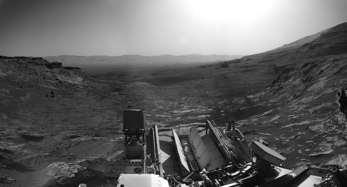 NASA’s Curiosity Mars rover used its black-and-white navigation cameras to capture panoramas of this scene at two times of day. This was the view at 8:30 a.m. local Mars time.