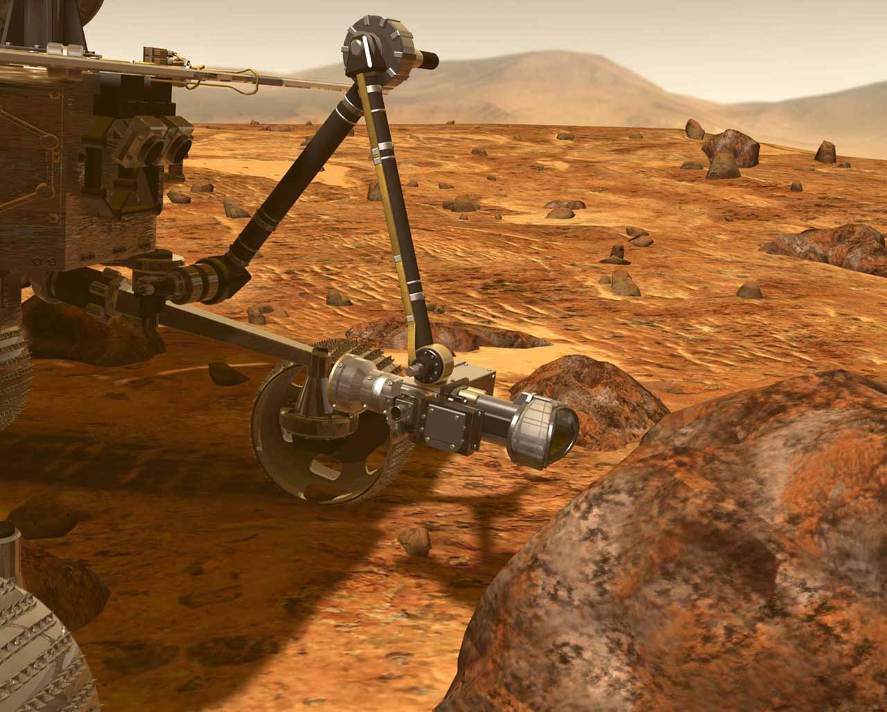 Artist's concept of rover using the rock abrasion tool (RAT) on the robotic arm grinds away the rock's surface, allowing scientific instruments to analyze the rock's interior.