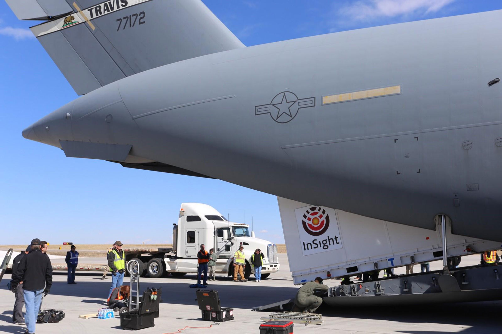 Personnel supporting NASA's InSight mission to Mars load the crated InSight spacecraft into a C-17 cargo aircraft at Buckley Air Force Base, Denver, for shipment to Vandenberg Air Force Base, California. The spacecraft, built in Colorado by Lockheed Martin Space, was shipped February 28, 2018, in preparation for launch from Vandenberg in May 2018.