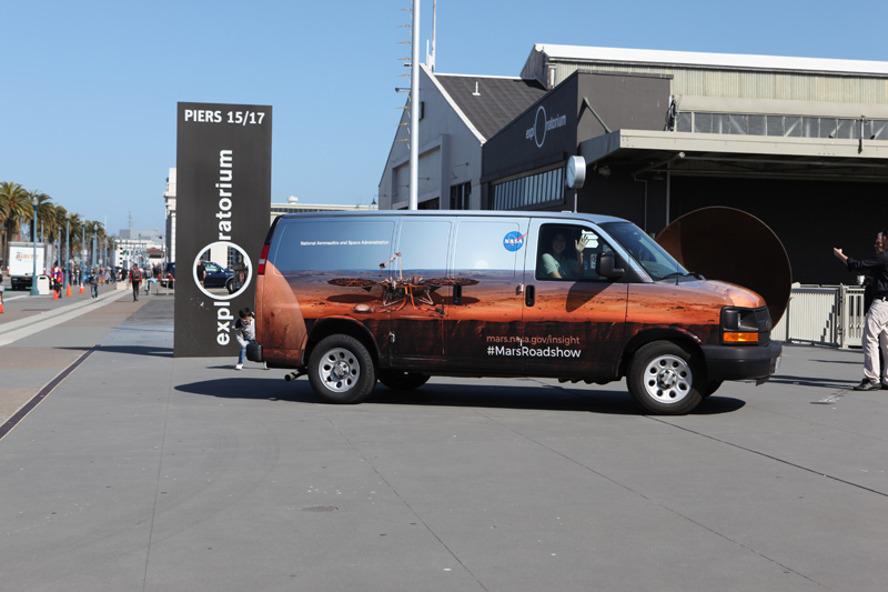 This is an image of the Mars InSight Roadshow van at San Francisco's Exploratorium in April 2018.